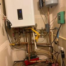 Upgrading-a-tankless-water-heater-in-Seattle-Washington 2