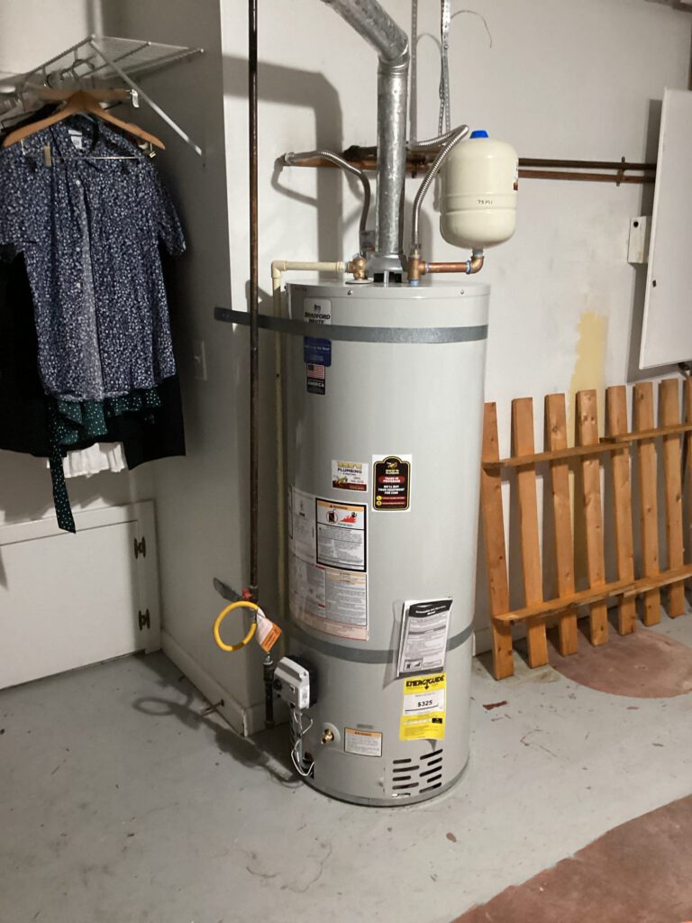 Tank Water Heater Install in Seattle Wa - Photo 1