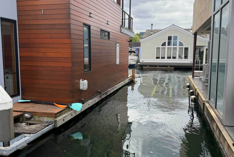 A quiet Seattle floating home community along a Lake Union waterway, part of the service area for Bee's Plumbing.